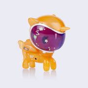 Vinyl unicorn figure wearing an orange space suit with a purple tinted face shield. Some stars and sparkles are appliquéd onto the face.