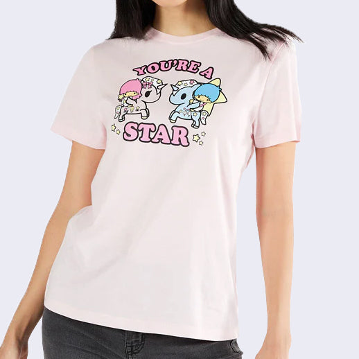 Light pink t-shirt with Sanrio's Little Twin Stars riding similarly decorated Unicornos. "You're a star" is written in pink bold outlined font.