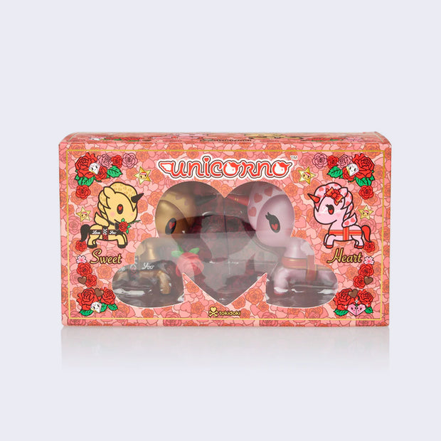 Product packaging for 2 Valentine's Day unicorn figures in a red and pink floral pattern box.