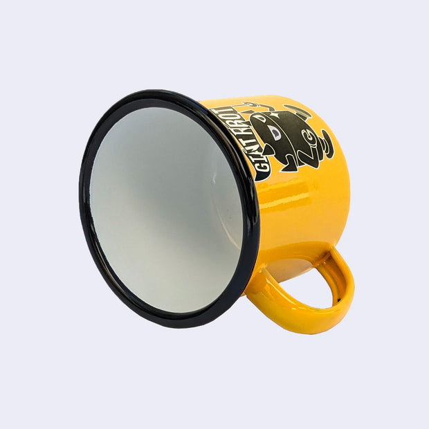 Bright yellow enamel mug with a graphic of a black robot with a white outline, toting a rippled flag that reads "Giant Robot." Rim of the mug is lined black with a white interior.